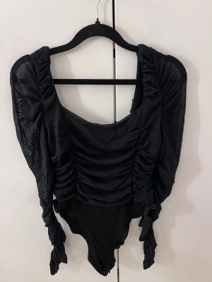 Body  - Svart body , som ny