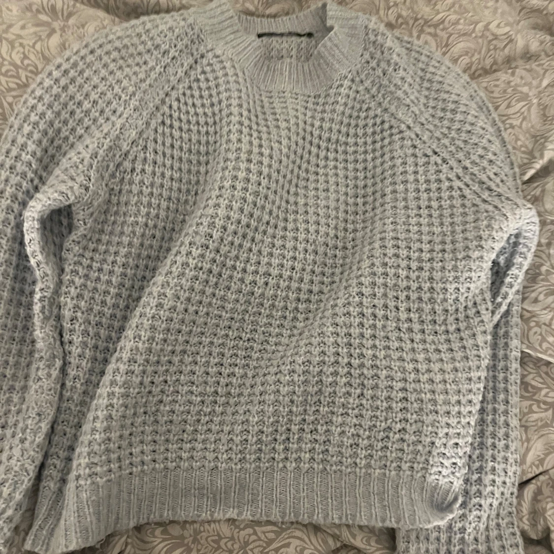 Ljusblå stickad tröja från 157