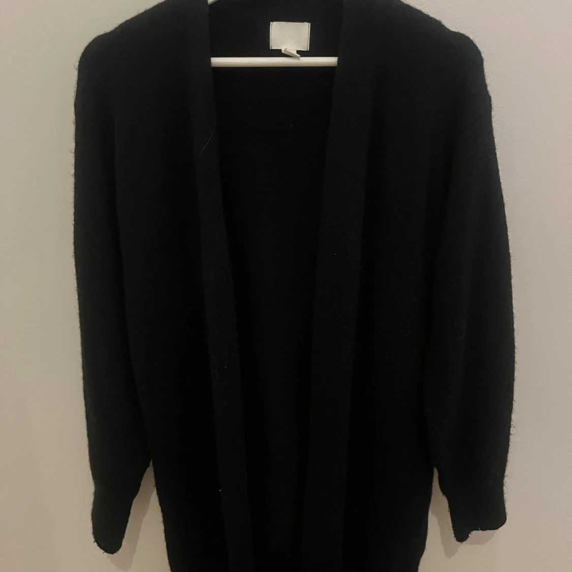 Svart lång kofta från H&M, XS