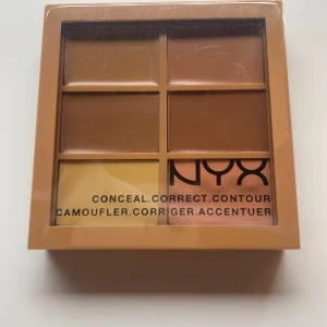 NYX Colour Correct  Palette - En smidig palett från NYX med sex krämiga nyanser för att täcka, korrigera och skulptera ansiktet. Färgerna går i beige, brunt, gult och persika, perfekt för att highlighta, dölja och konturera. Paletten är i plast och passar dig som gillar att experimentera med olika looks.