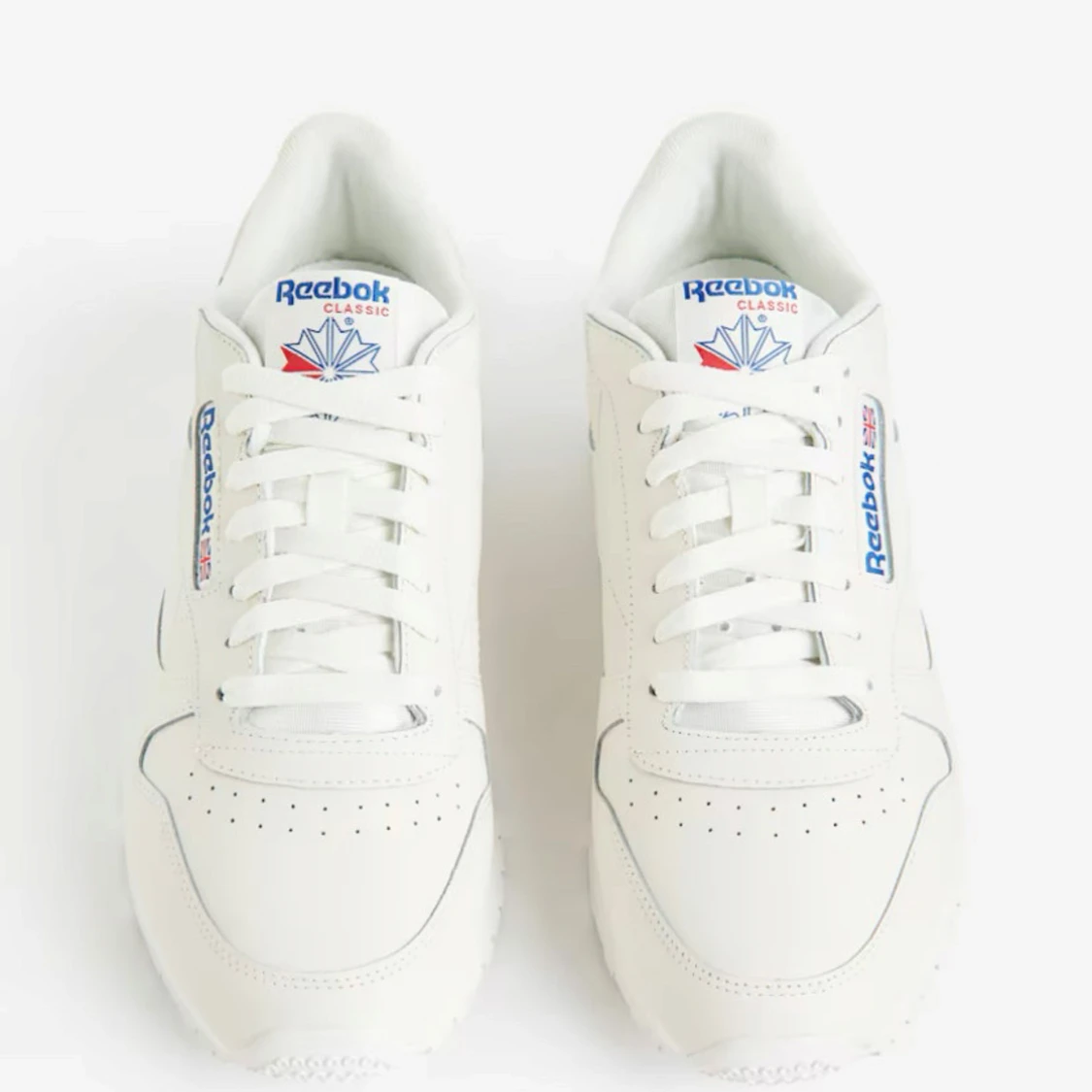 Vita Reebok Classic sneakers i skinn