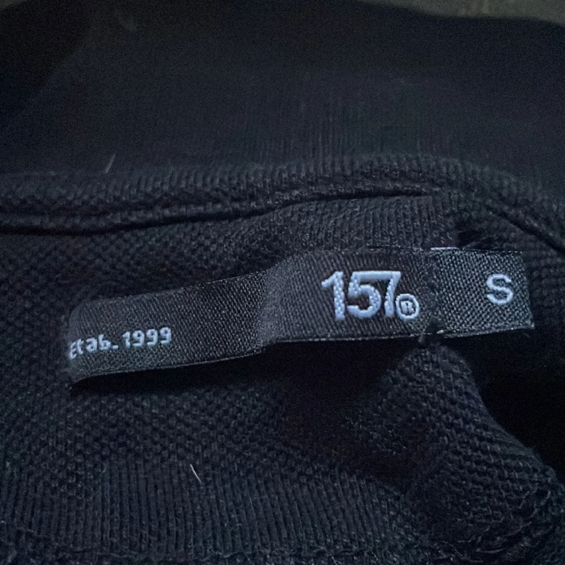 Svart Knapp piké  - 91