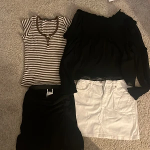 Två söta toppar, blus, jeanskjol och en volang kjol - Alla kläder är i bra skick och är knappt använda man kan köpa alla för ett paket pris (150kr) eller välja ut några man gillar särskilt mycket