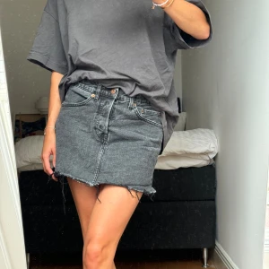 Jeanskjol - Jeanskjol, slits på sidorna 