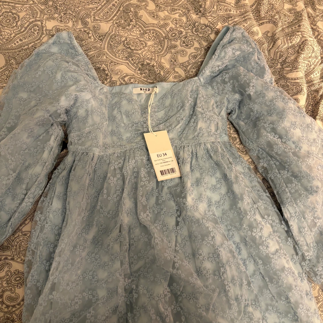 Ljusblå klänning - 91