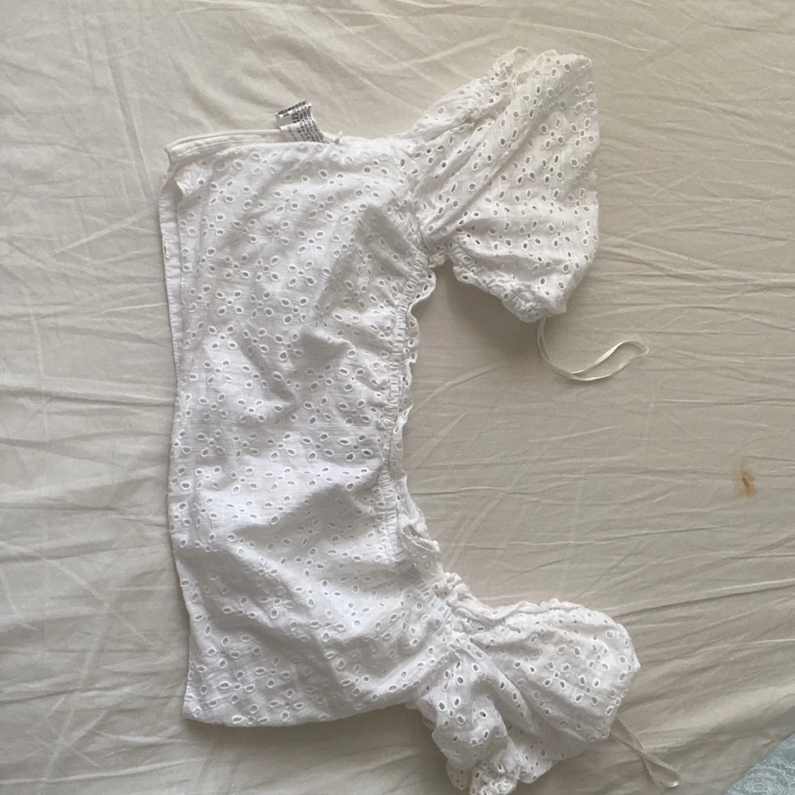 En somrig vit topp  - 90