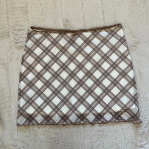 Rutig minikjol / Miniskirt  - Aldrig använd! Stl XS från H&M divided. 