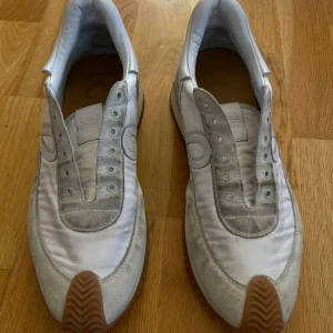 Loewe Flow Sneakers  - In a very good condition. Just need a lit bit of cleaning. Comes with box and dustbags