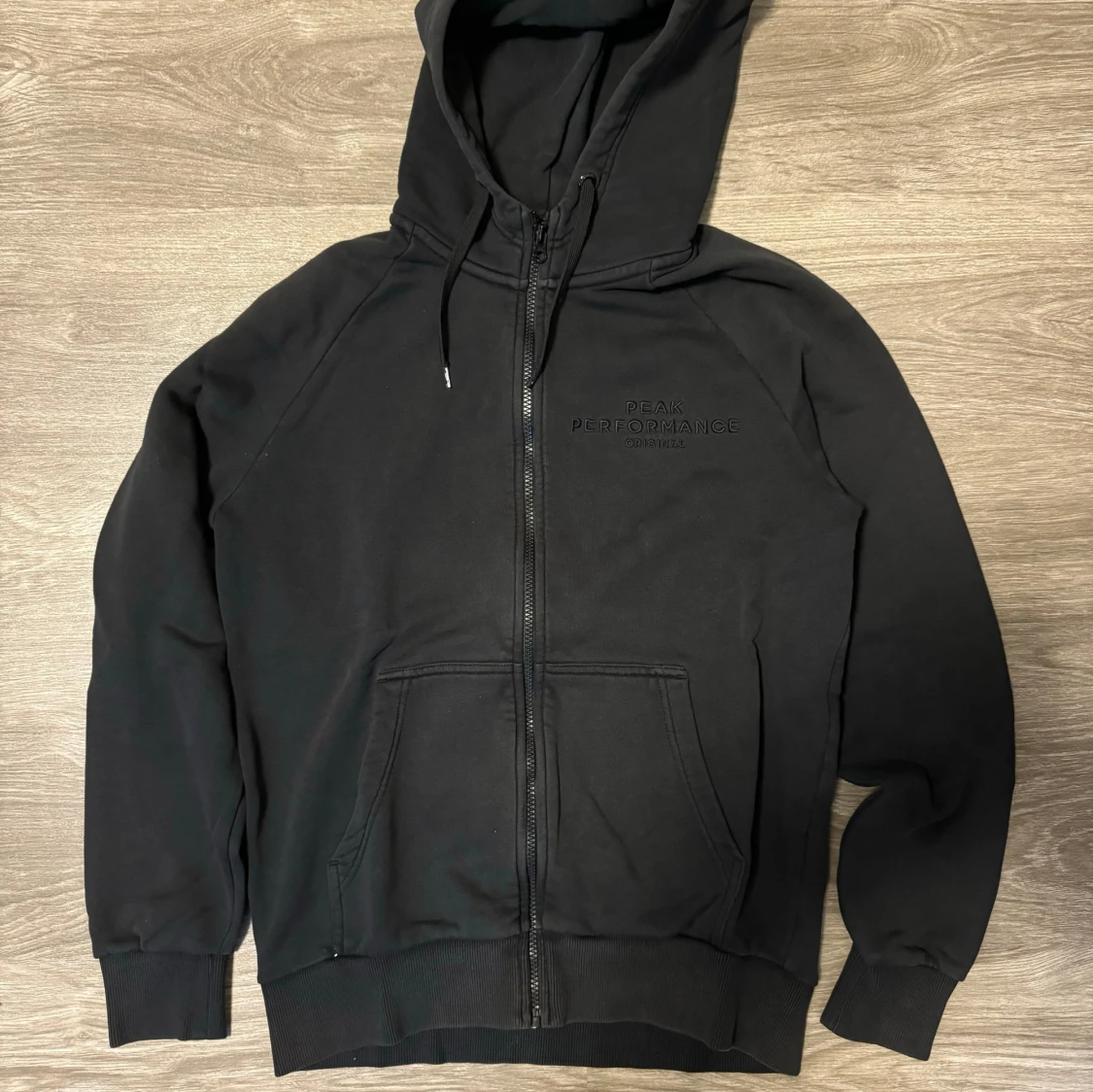 Svart Peak Performance kofta , storlek M