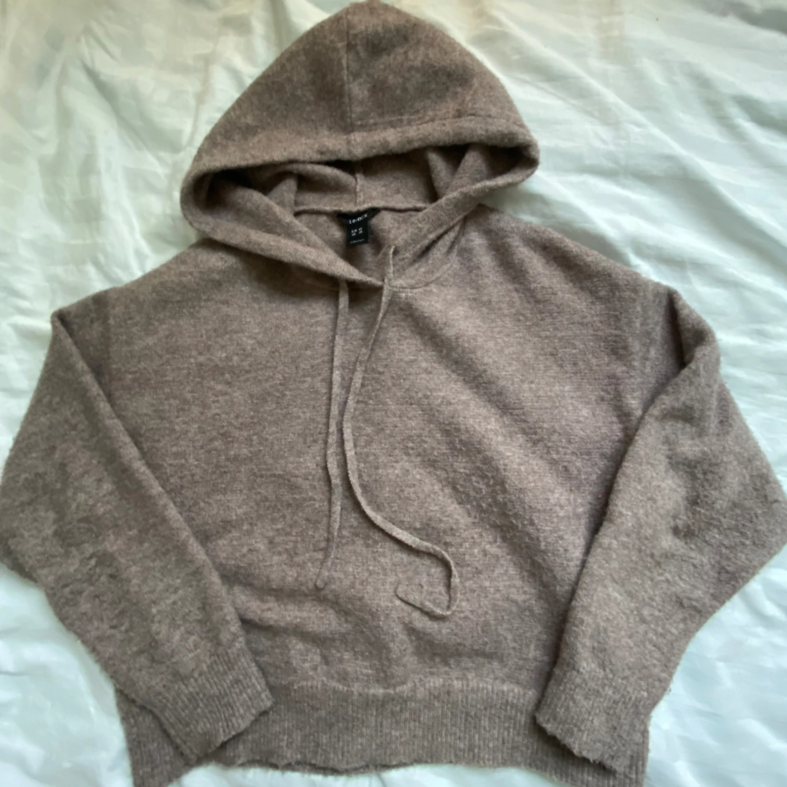 Stickad hoodie