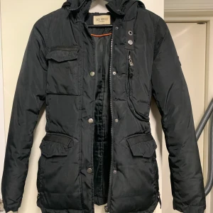 Vinterjacka - Svart vinterjacka från roco baroco