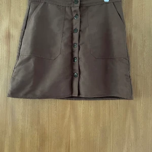 Kjol med knappar - Sammet