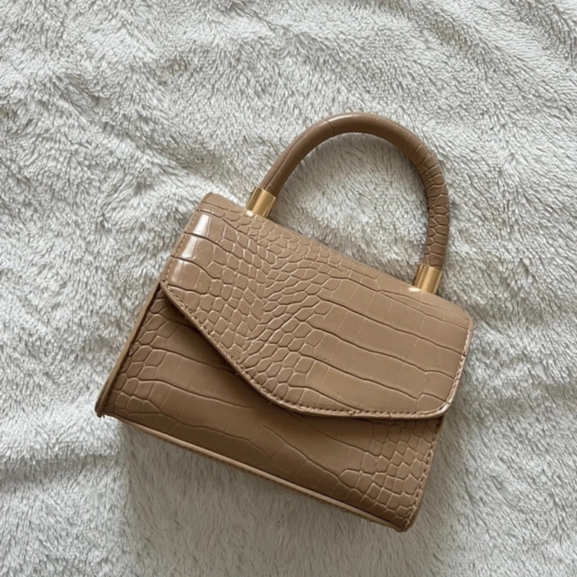Beige crossbody handbag