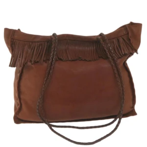 Prada väska - Ursprung: Italien  Material: läder Färg: brun Tillbehör: inga