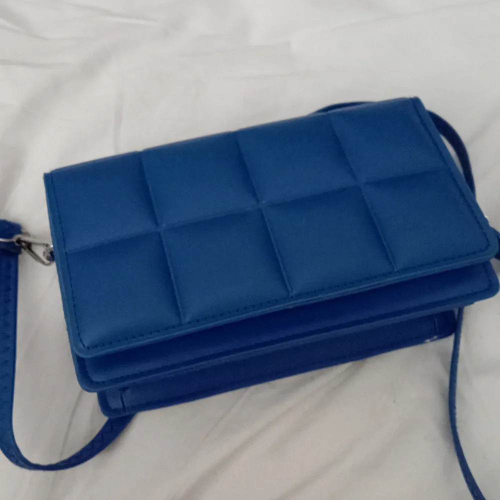 Small purse, completely unused. Väskor.