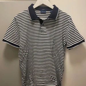 Gant tech prep piké  - Strl large. Sparsamt använd. 