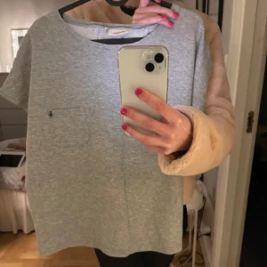 Kortärmad sweatshirt  - T-shirt/kortärmad sweatshirt från Redgreen. Använd endast en gång!! Supersnygg! Storlek L men passar s-l