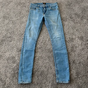 Ljusblå Lee Jeans i denim - Ljusblå denim jeans, stretch. Mycket gott skick.