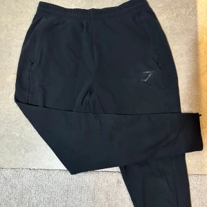 Gymshark träningsbyxor - Svarta träningsbyxor/mjukisbyxor från gymshark i fint skick. 