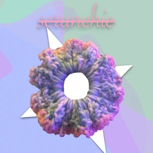 Blå/rosa handgjord virkad scrunshie - Blå/rosa handgjord virkad scrunshie, denna produkt är till för alla hår typer💕