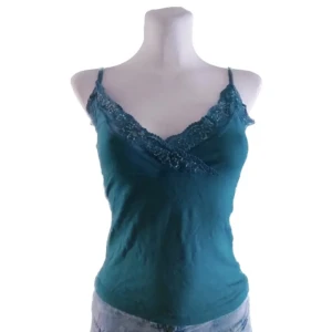 Blå grönt linne - Jätte söt linne som jag säljer för det inte kommer till nån användning, bilderna är lånad från föras ägaren! Om ni undrar nåt så är det bara att fråga 