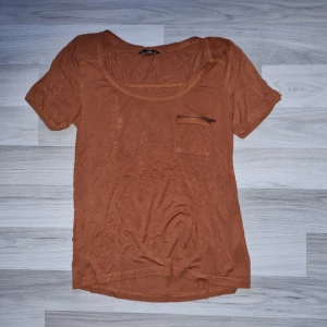 Topp - Rostbrun topp från H&M. 