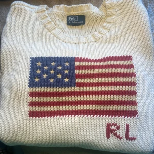  ralph lauren stickad - Polo Ralph lauren tröja med usa flagga. Passar dig som är ca 160 cm lång. Skriv vid funderingar 