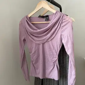 Purple top, in light material 