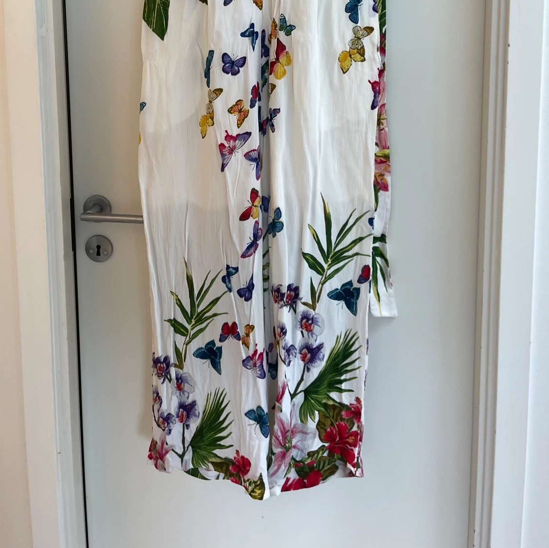 Jumpsuit med blommor - 92