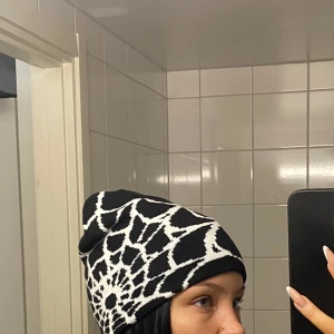 Spindelnätsmössa - Helt ny, endast testad  