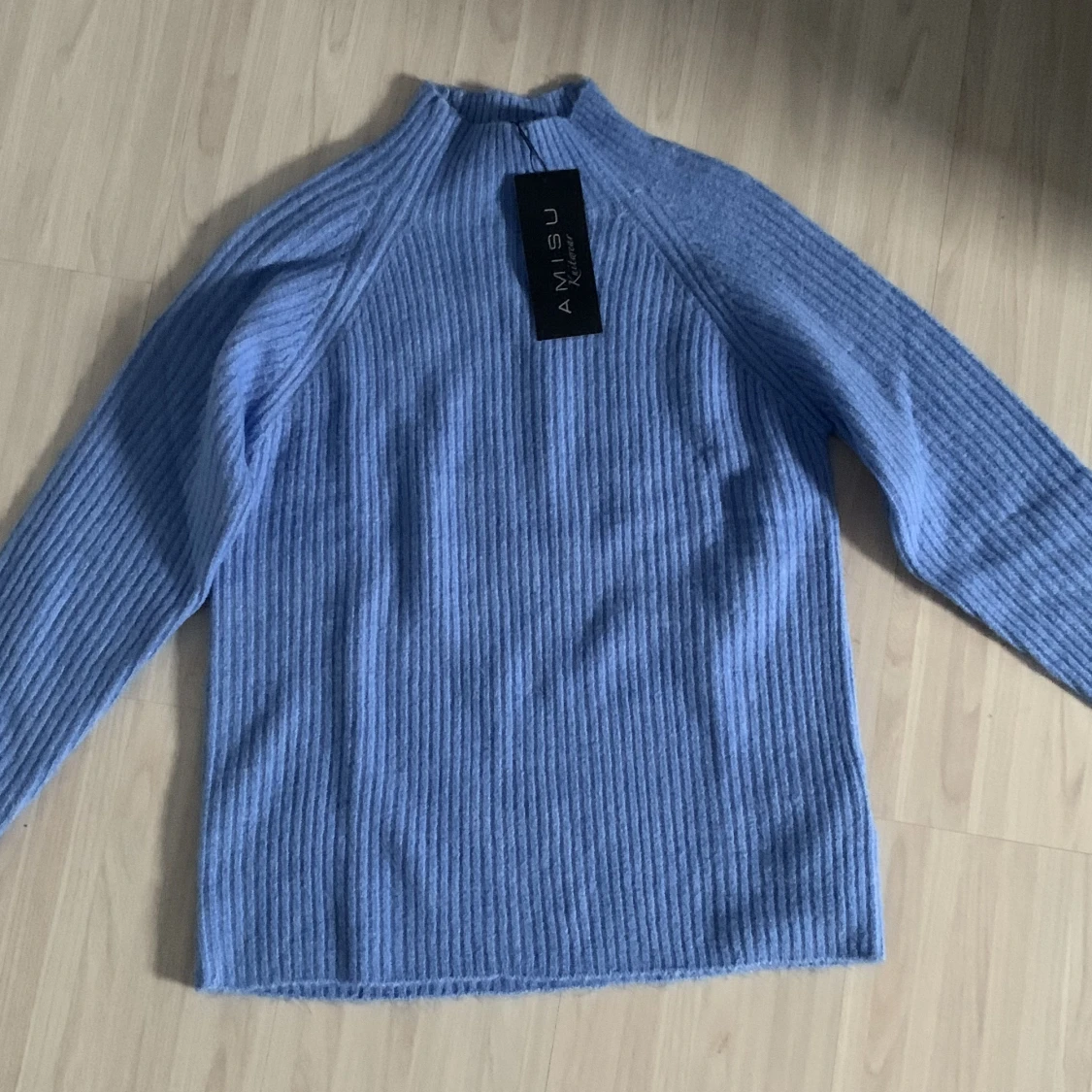 Blå stickad tröja  - 91