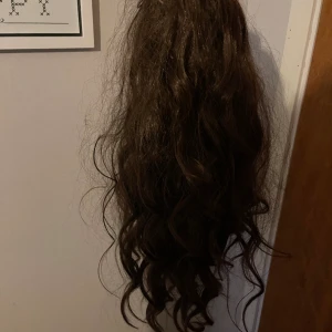 Löshår - Löshår / tofs från tizewe hair Endast testat Färg mörkbrunt
