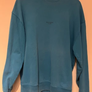 Acne studios tröja - Xs collegetröja men liten acne logga framtill.  100% bomull  Färg turkos blå 