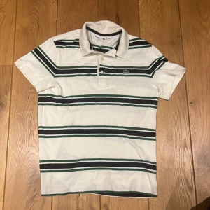 Lacoste piké - En riktigt fet Lacoste piké med bra passform