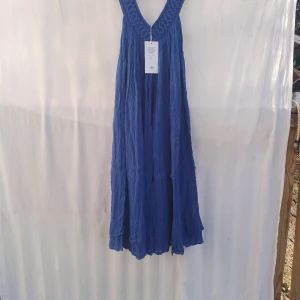 Tunika  one size. 95% bomull/5% viskos - Från grekisk/italienska Grimani. Helt ny med etikett . Behagligt, lite rynkigt tyg. Tvätta och häng Ingen strykning behövs 