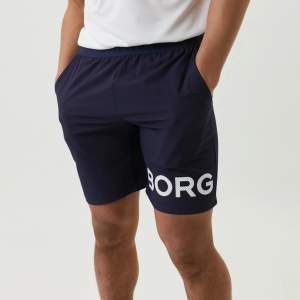 Supersnygga shorts från Björn Borg i mörkblått.  Helt nya med lapp kvar. Nypris 399