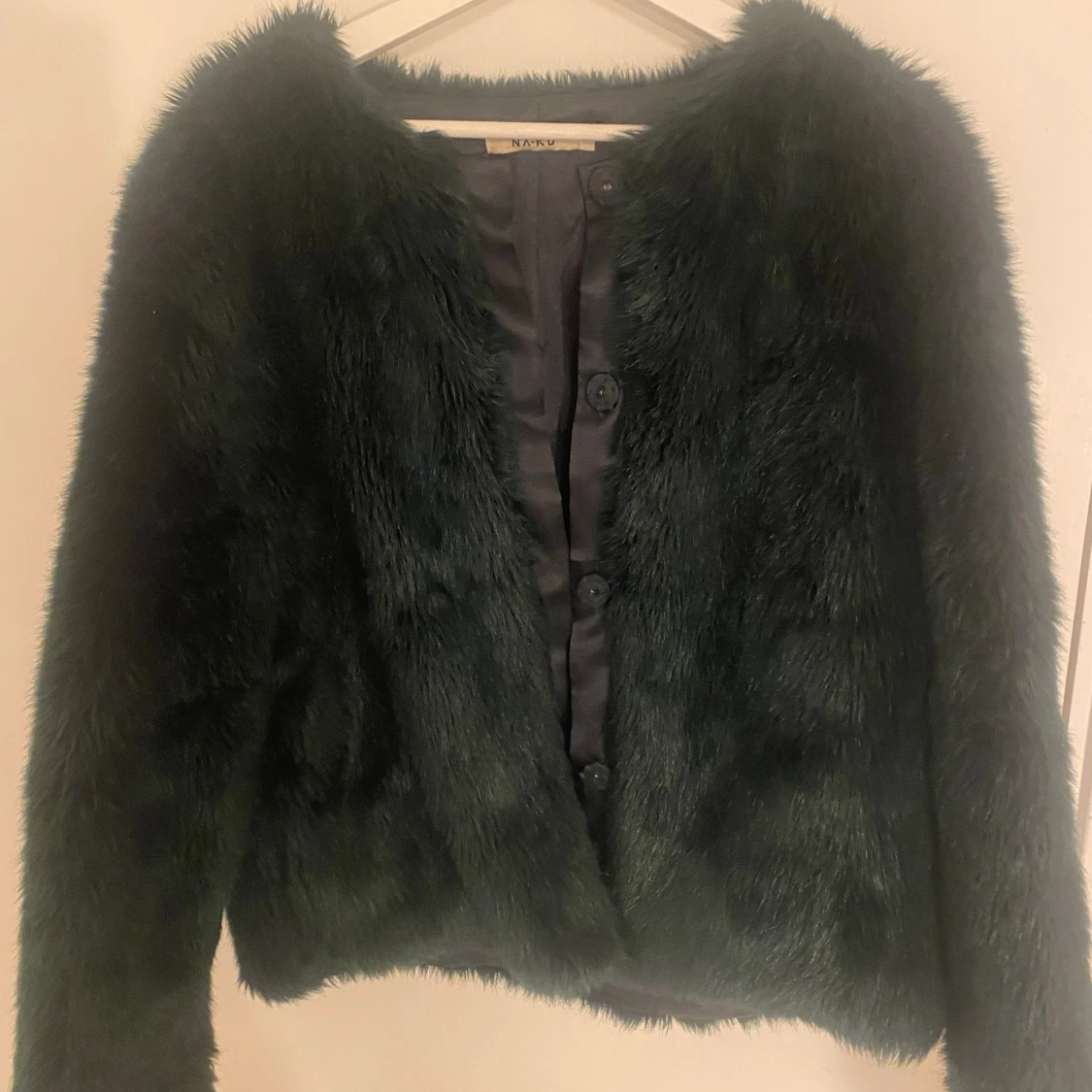 en mycket fin grön päls jacka från nakd 