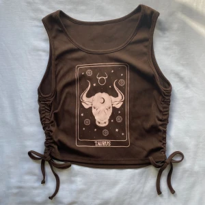 Taurus tank top  - En brun snygg tanktop som inte har varigt väldigt använd, storlek M