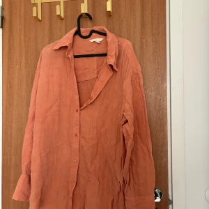 Skjortq - Tunn orange skjorta