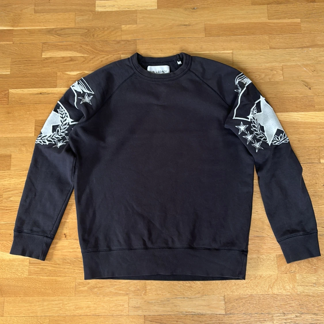 Our Legacy washed black eagle