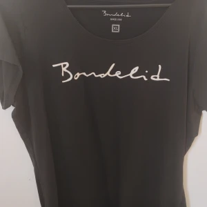 Bondelid tunika  - Ny bondelid tunika stl xl, lite i stokleken,inga märken el urtvättade 