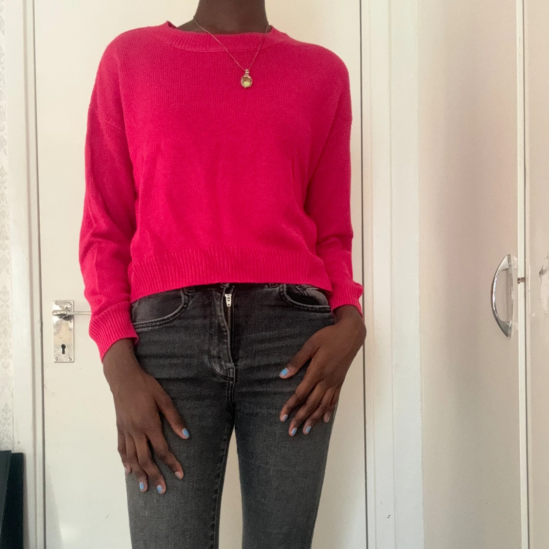 Röd-rosa stickad tröja