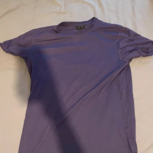 Tshirt - Lila t-shirt från NewYorker Använd fåtal ggr