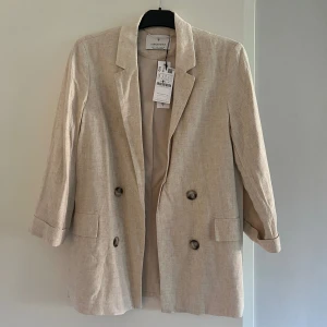 Linnekavaj  - Helt ny! Beige linnekavaj ifrån Stradivarius