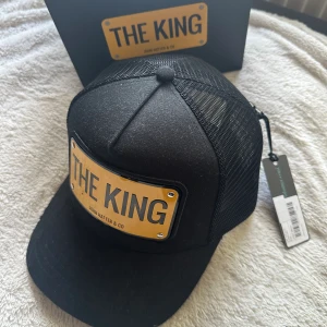 Ny John Hatter keps strl 58cm - Helt ny keps i kartong aldrig använd, strl 58, nypris ses på bild 2.