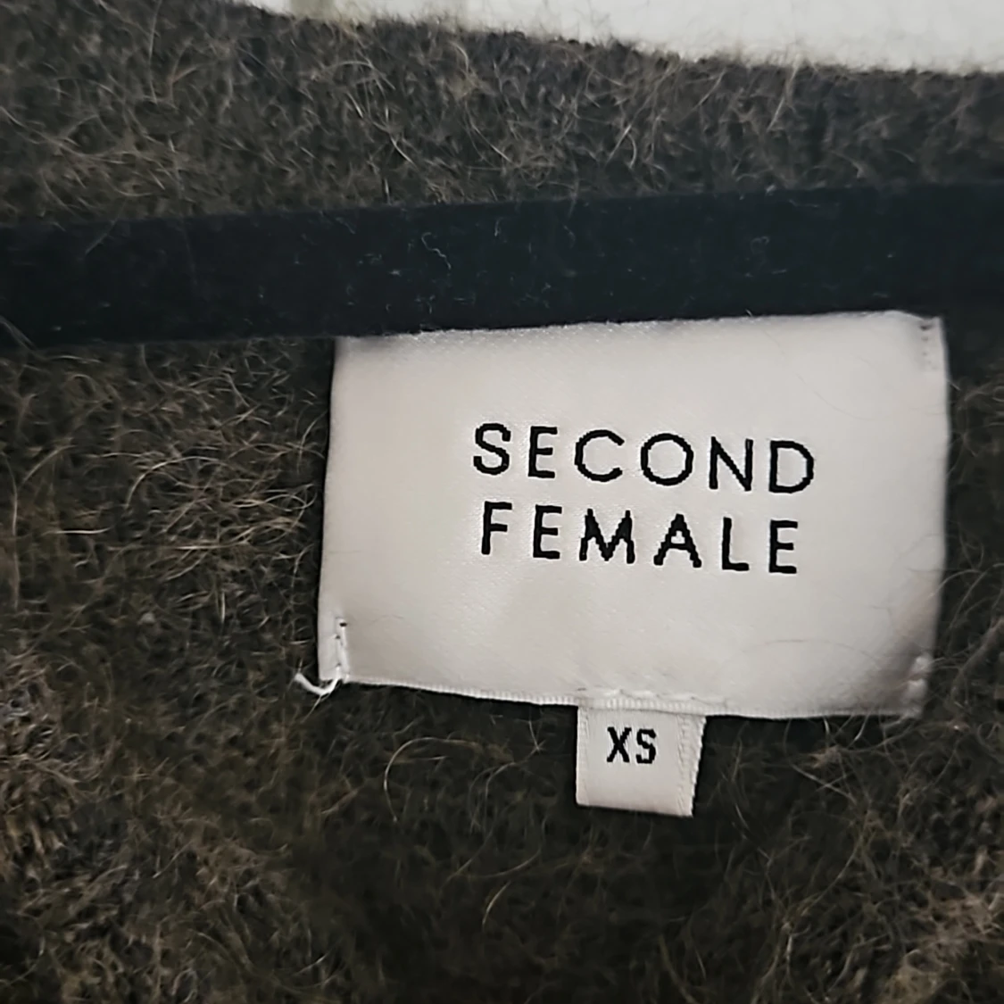 Mossgrön mohair/ull ttöja - 91