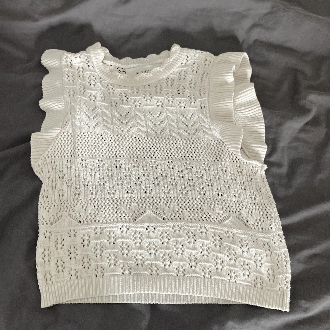 Stickad topp