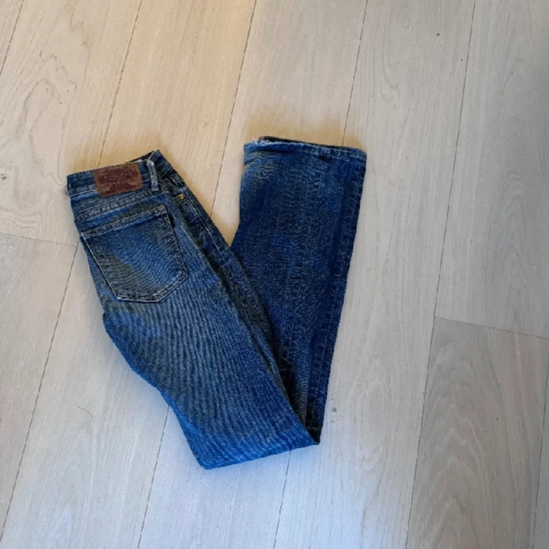 Lågmidjade utsvängda jeans - 92