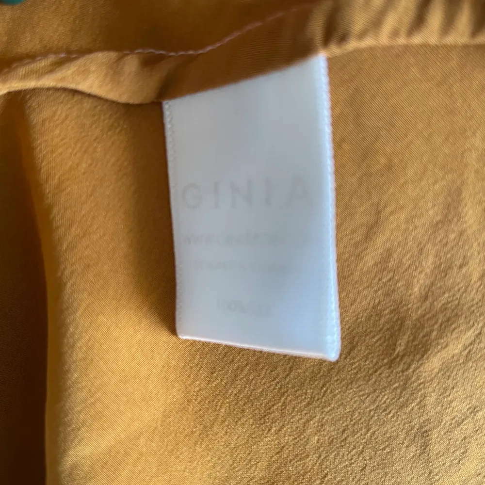 Minimalist Ginia Hand Dyed Caramel Silk Slip Dress  100% Silk  Adjustable Straps for the right fit.  Some naturally occurring discoloration, please appreciate for its character.  Very Good Condition  Model Is 160cm (5”3) And Generally Fits XS/S. . Klänningar.