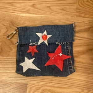Self seen mini clutch with clipps - The strawberry and star is the button worn never attach any strap you want